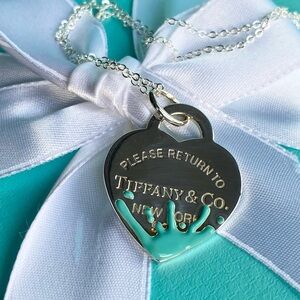 Tiffany & Co. New, Sterling Silver Return to Tiffany blue splash Heart Pendant.